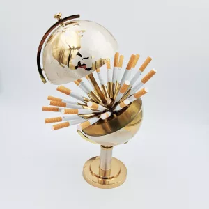 Vintage cigarettes dispenser shape of an earth globe