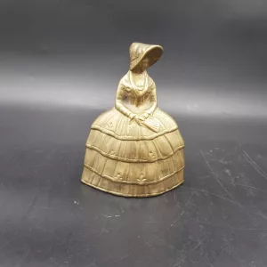 Brass table bell Shape of a woman in hat and crinoline 1960s France