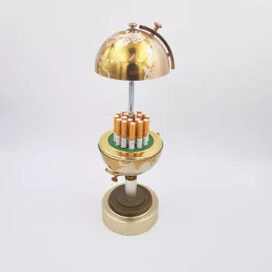 Vintage cigarettes dispenser shape of a small earth globe