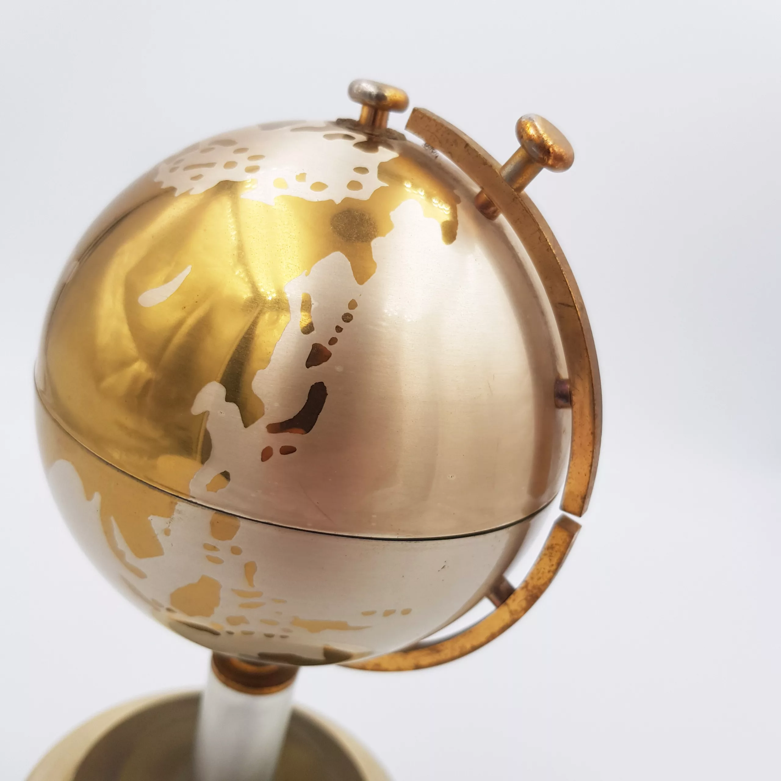 Vintage cigarettes dispenser shape of a small earth globe