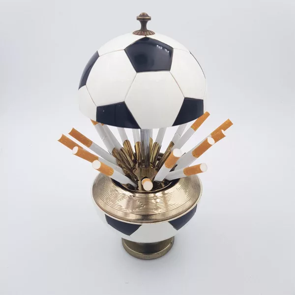 Vintage cigarettes dispenser shape of a soccer ball