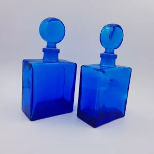 2 vintage cobalt blue glass flasks