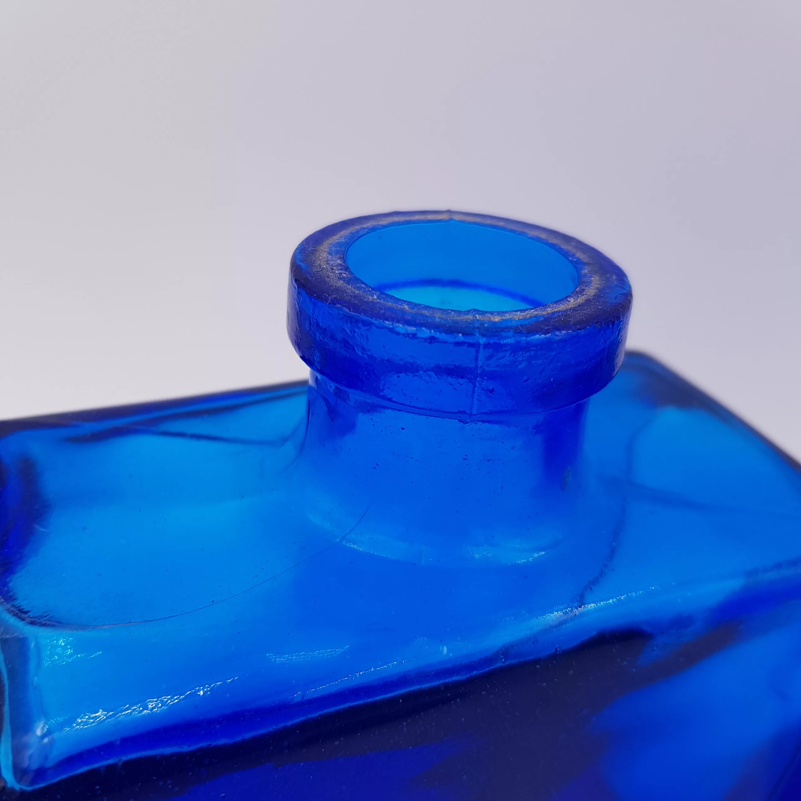 2 vintage cobalt blue glass flasks