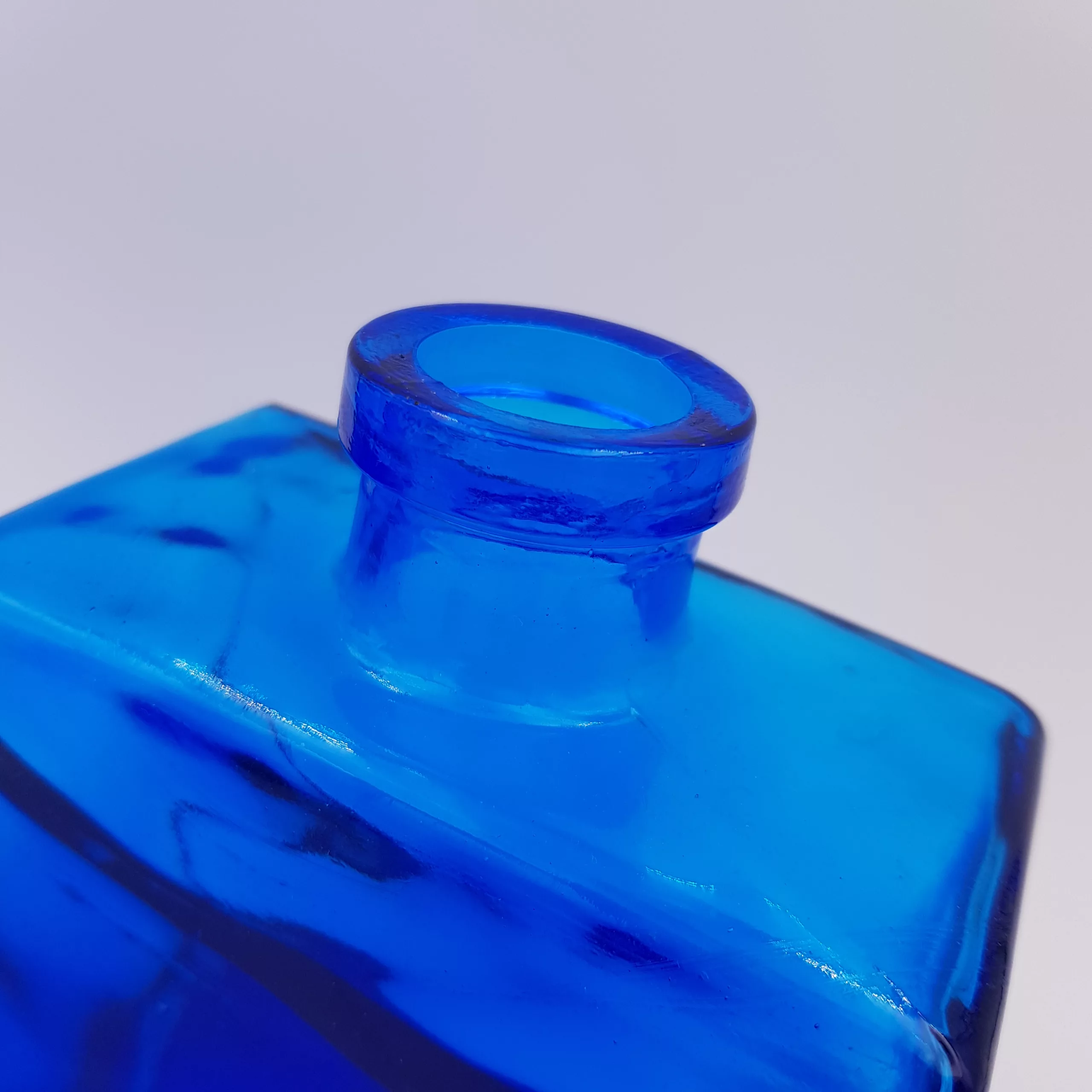 2 vintage cobalt blue glass flasks