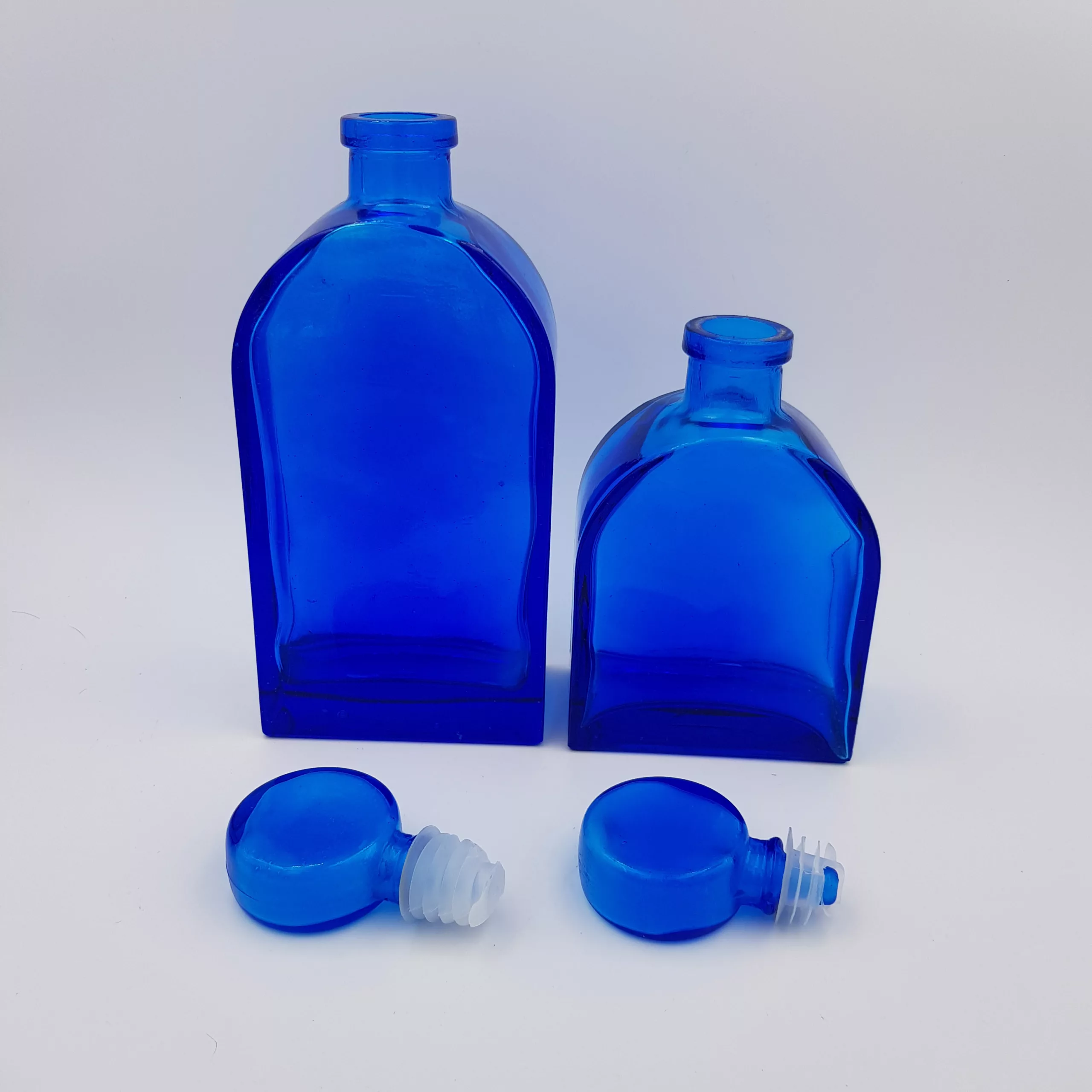 2 vintage cobalt blue glass flasks round shoulders