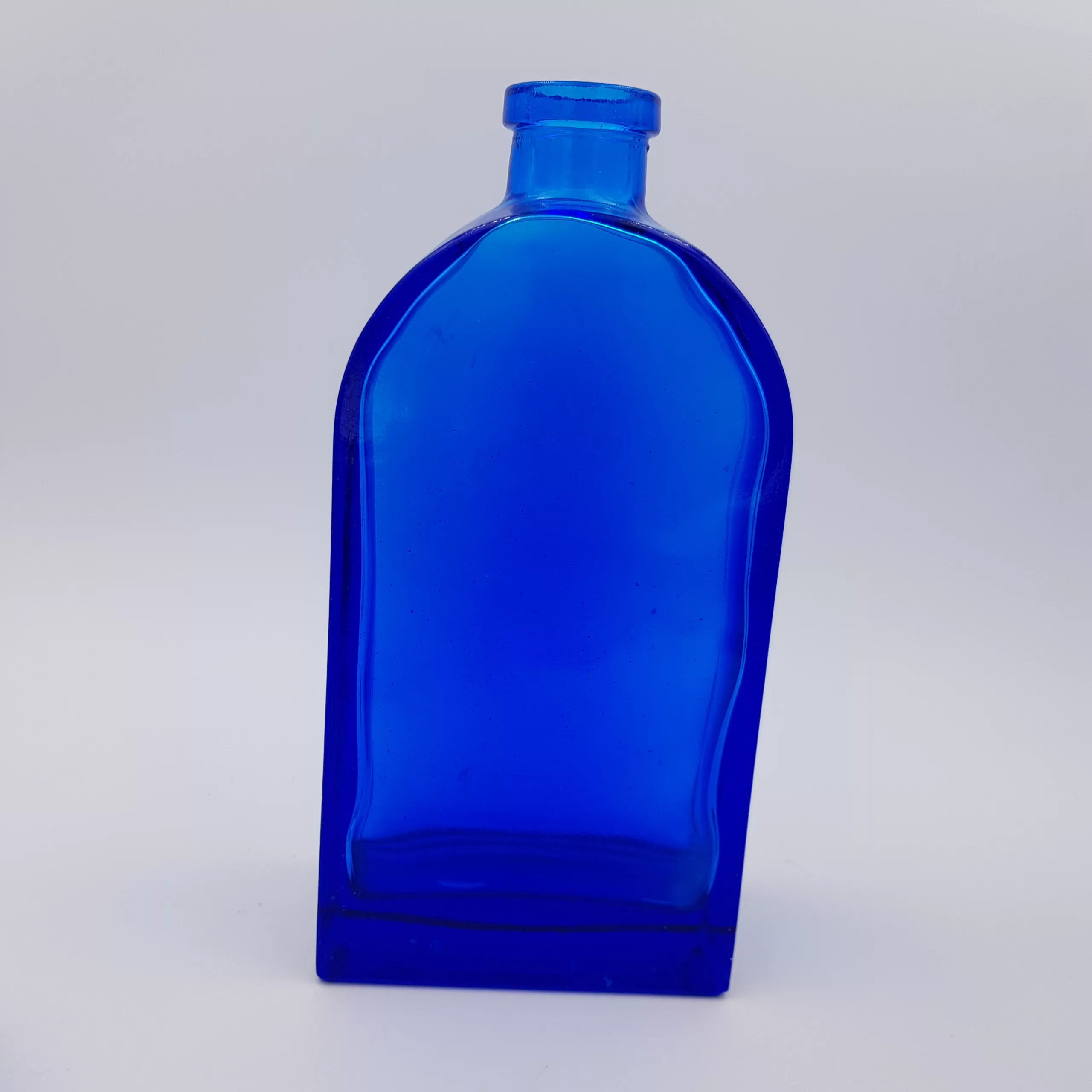 2 vintage cobalt blue glass flasks round shoulders