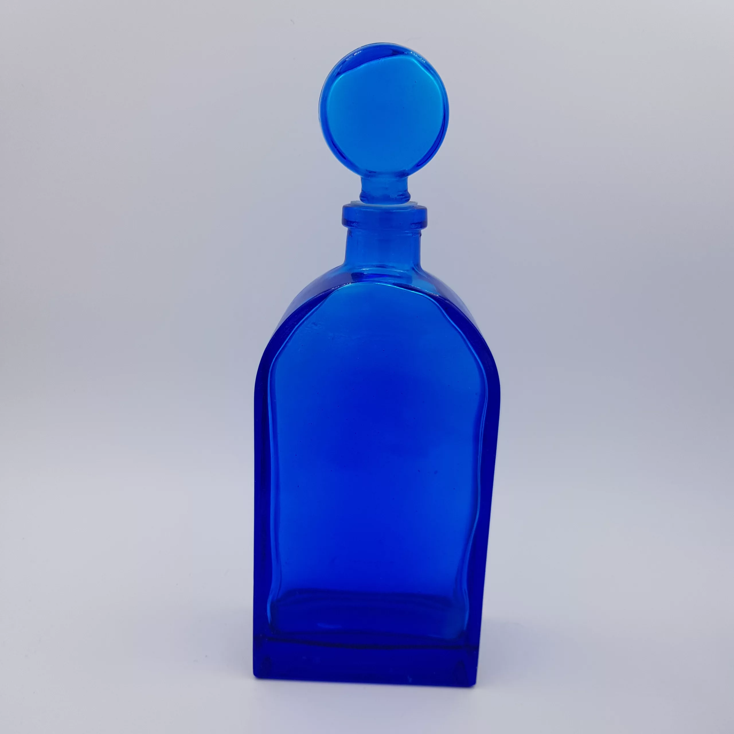 2 vintage cobalt blue glass flasks round shoulders
