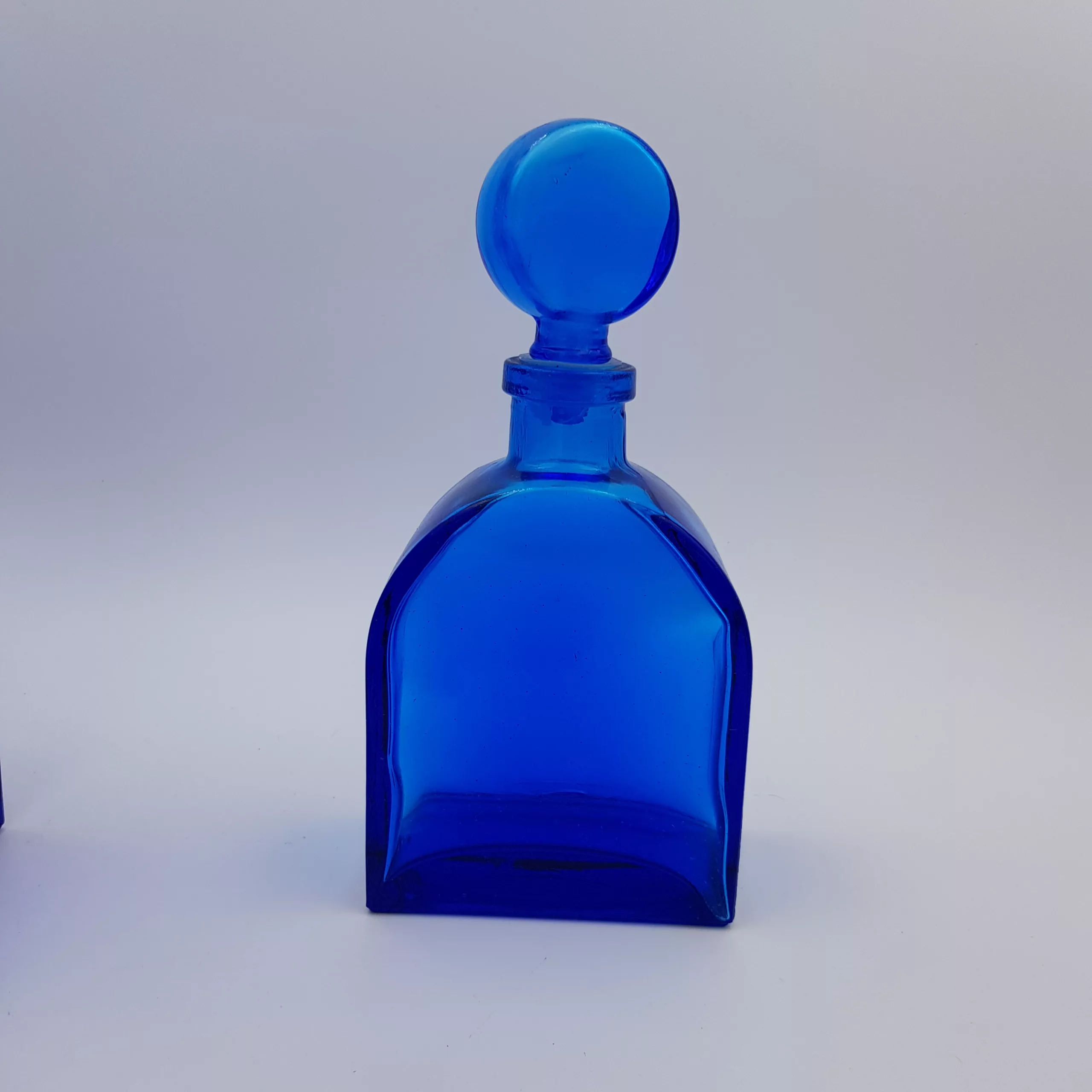 2 vintage cobalt blue glass flasks round shoulders