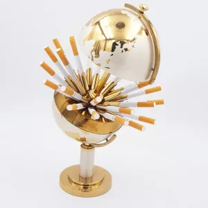 Vintage brass cigarettes dispenser shape of an earth globe