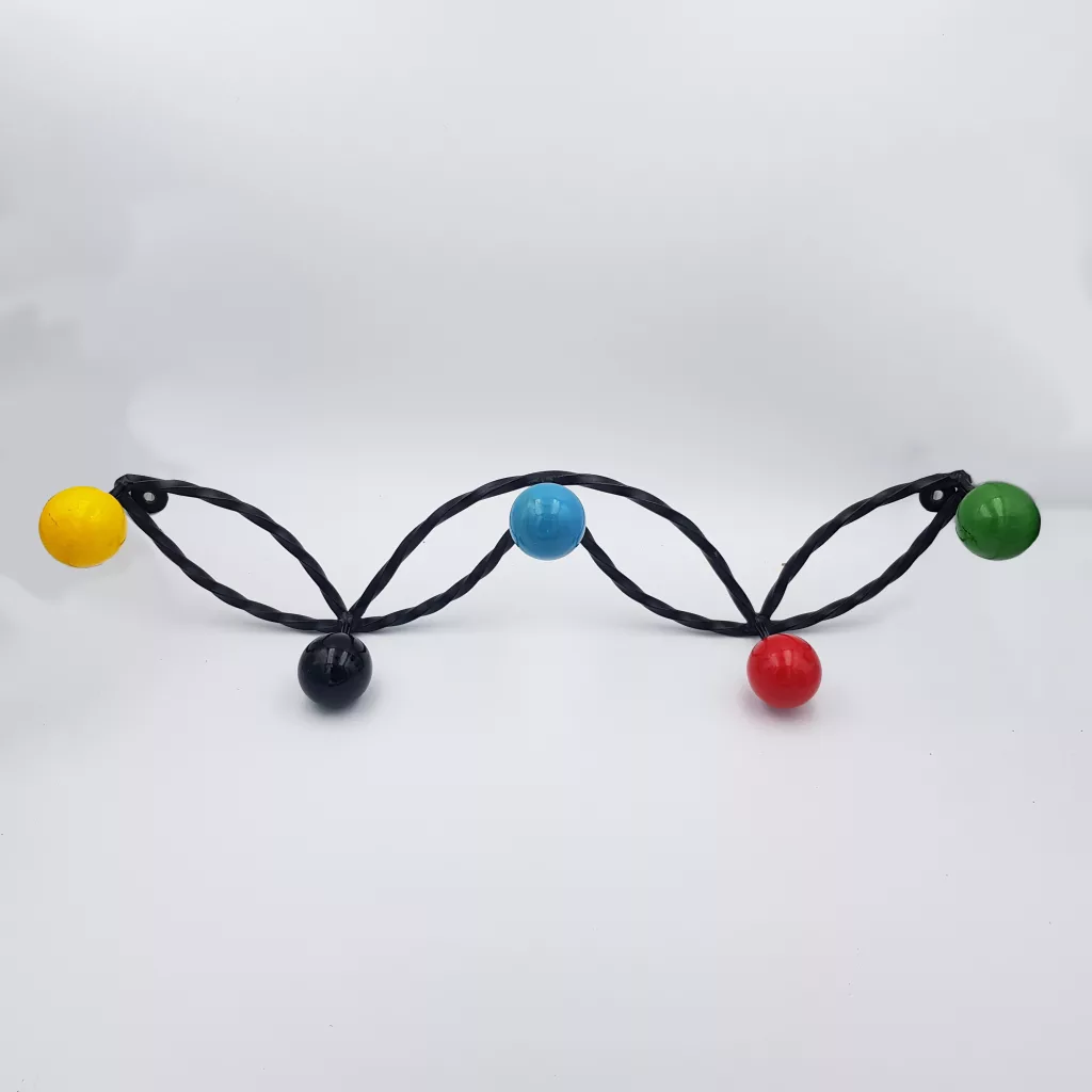 Vintage coat rack twisted metal colored wood balls Vintage coat rack twisted metal colored wood balls