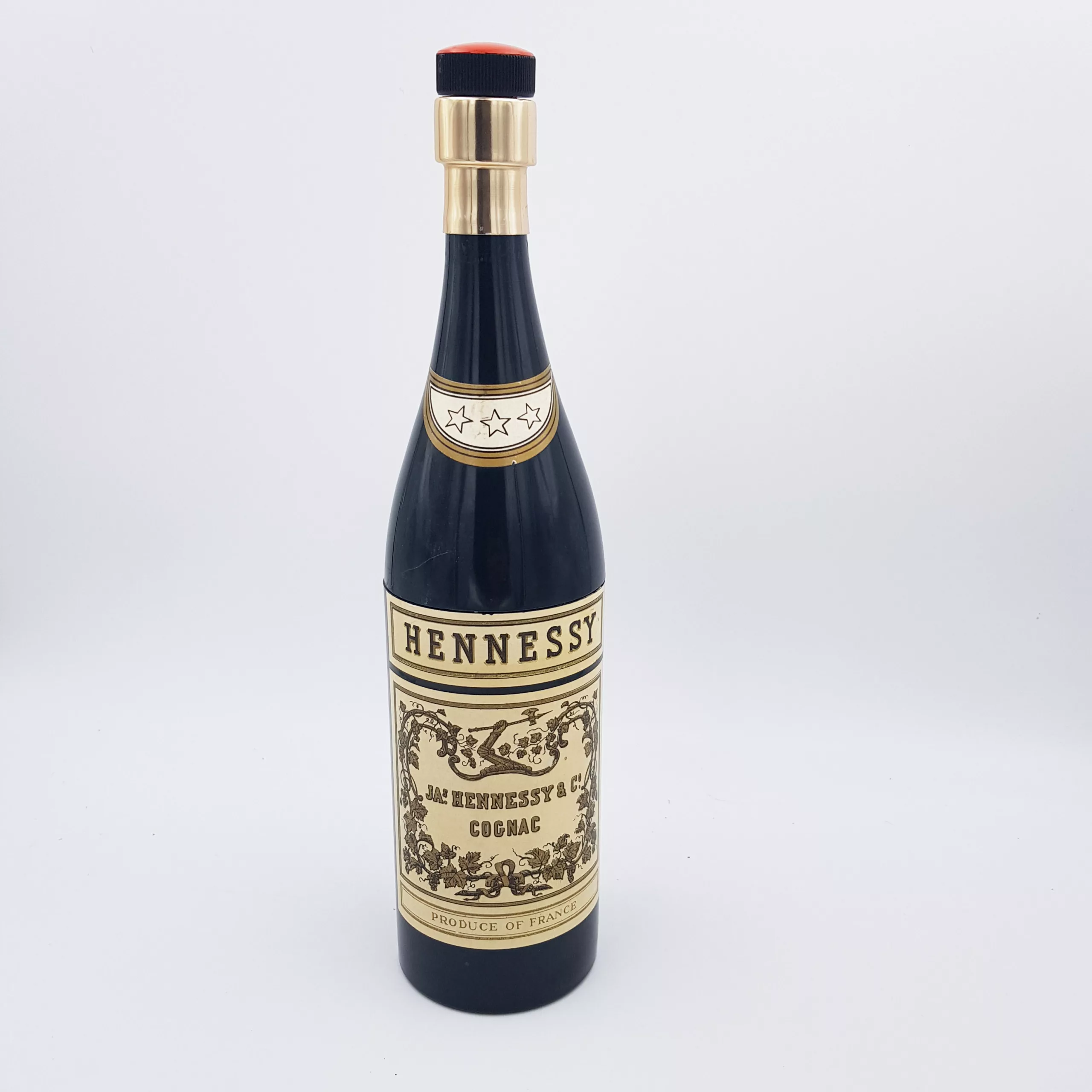 Vintage cigarettes dispenser shape of a bottle of cognac Hennessy musical box