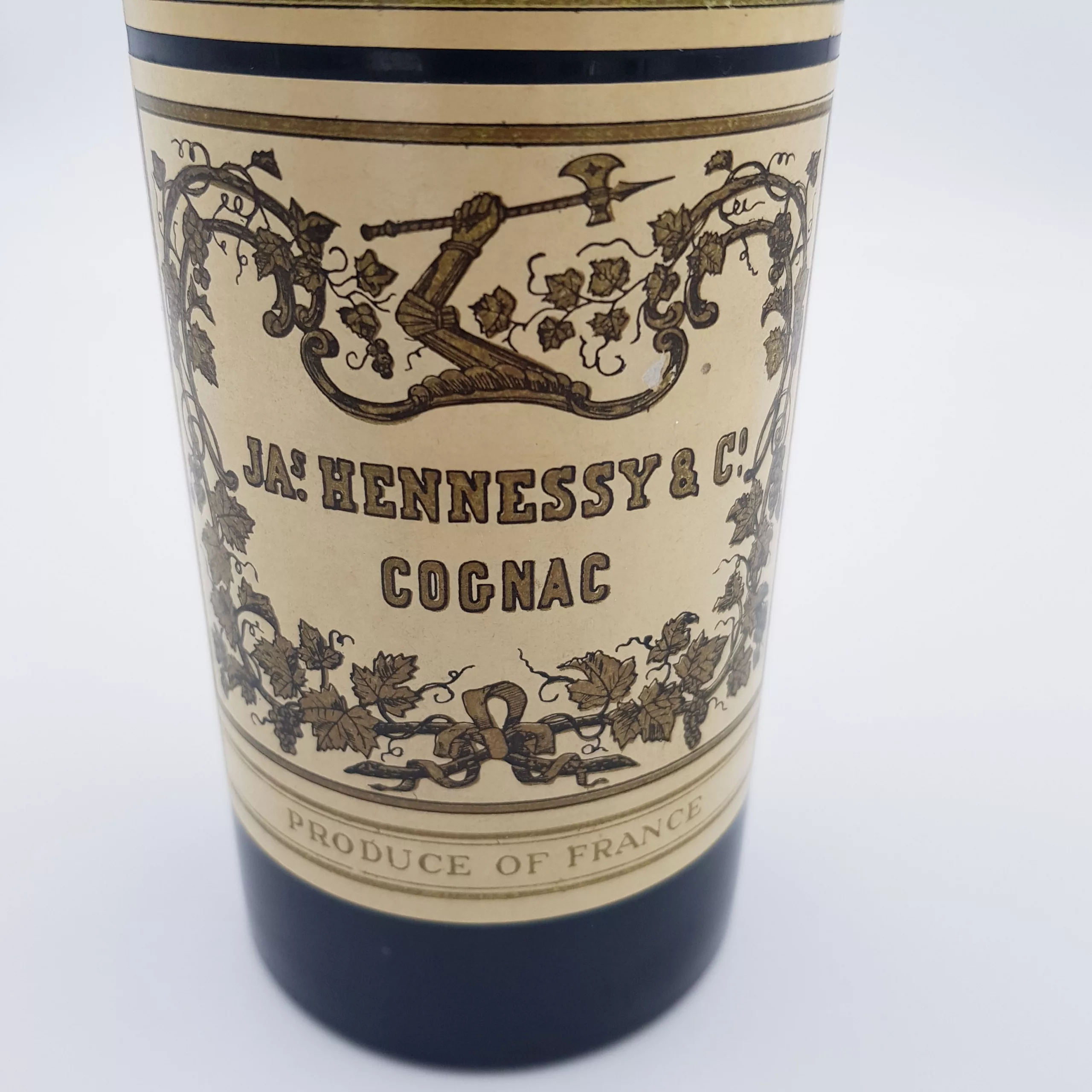 Vintage cigarettes dispenser shape of a bottle of cognac Hennessy musical box