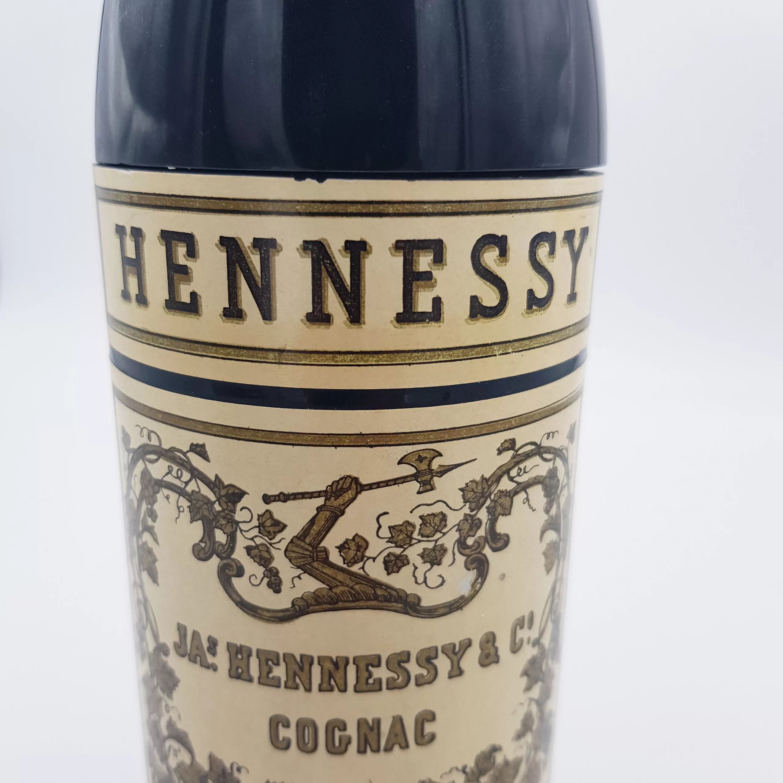 Vintage cigarettes dispenser shape of a bottle of cognac Hennessy musical box